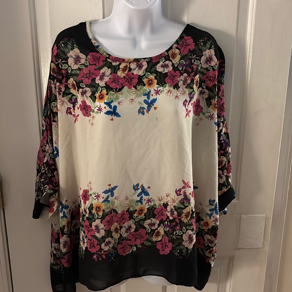 Beautiful semi- sheer floral blouse